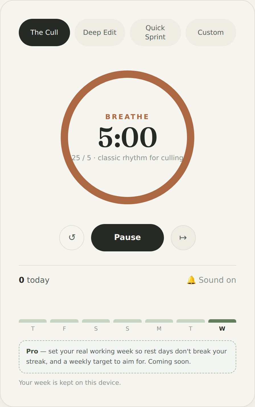 The Focus Timer in its break state, with a warm clay ring and the word Breathe